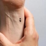 A semicolon tattoo